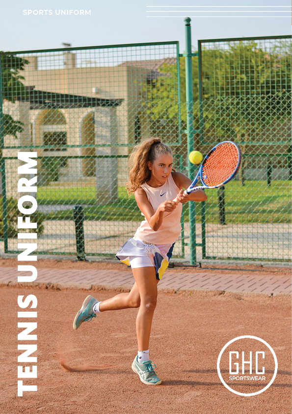 A female tennis player in a custom uniform, featuring a sleeveless top and skirt, playing on a clay court. The GHC Sportswear logo is visible in the bottom right corner.