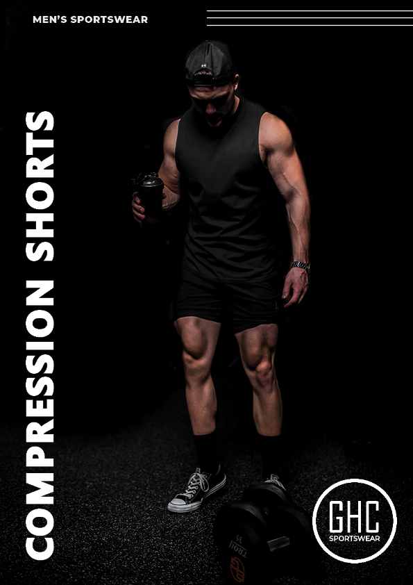 “Person wearing black compression shorts in a gym setting; custom OEM/ODM wholesale activewear produced by GHC Sportswear®.”