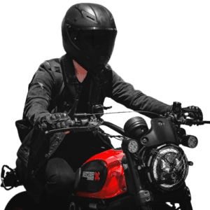 Motorbike rider wearing custom sportswear from GHC Sportswear, including a black helmet, gloves, and protective jacket, riding a red motorbike.