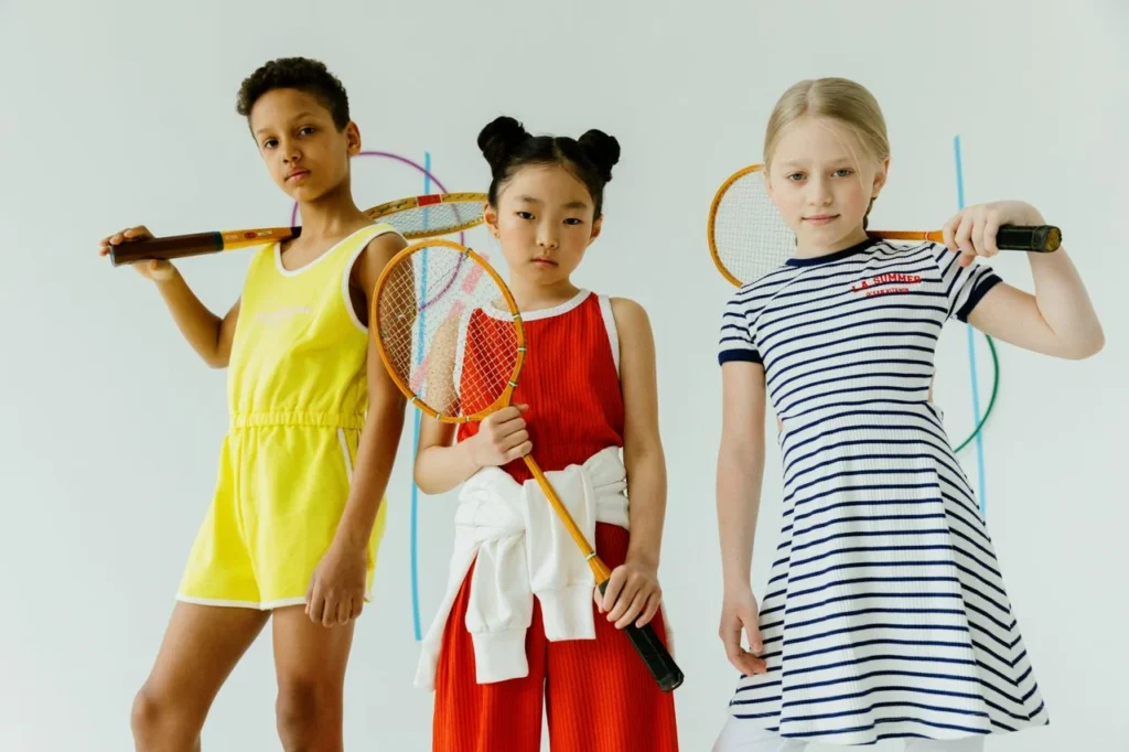 Badminton dress codes with custom badminton uniforms, non-marking shoes, breathable shirts, shorts, skorts, and sponsor-ready team apparel.