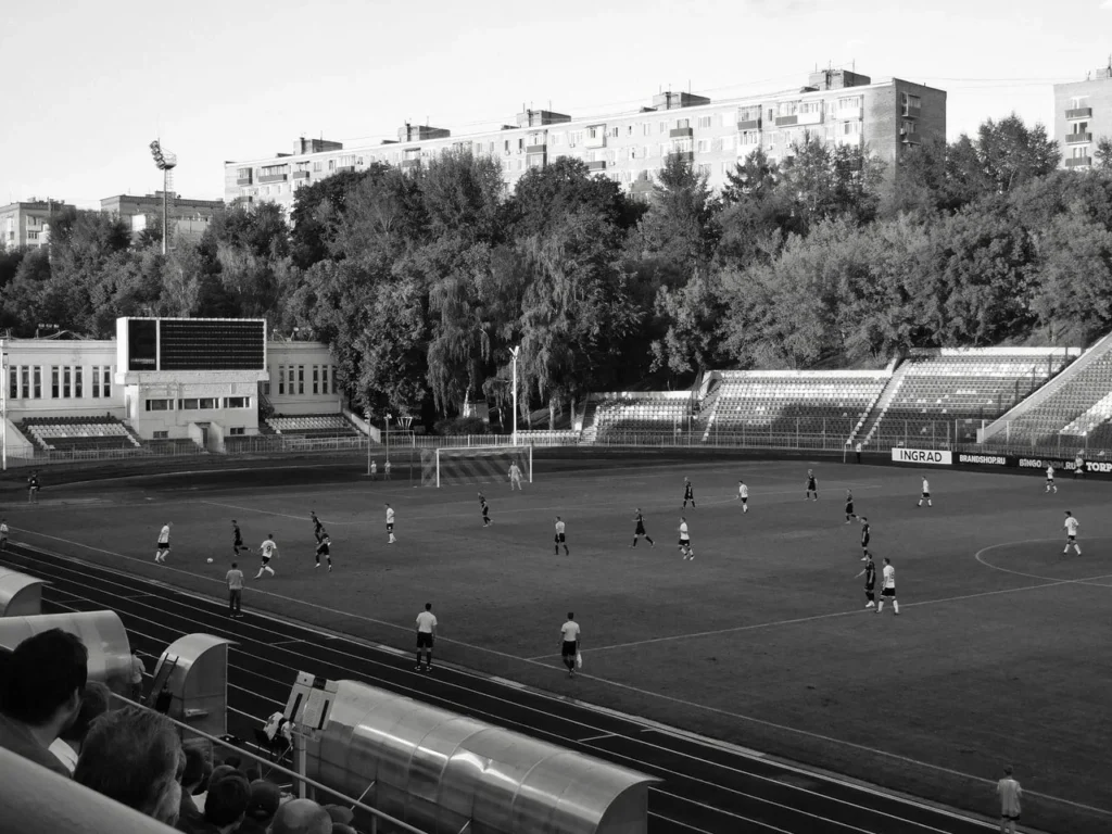 history of football: from ancient ball games to the global game 2 History of football shown through vintage football gear, modern custom football uniforms, stadium culture, and team identity.