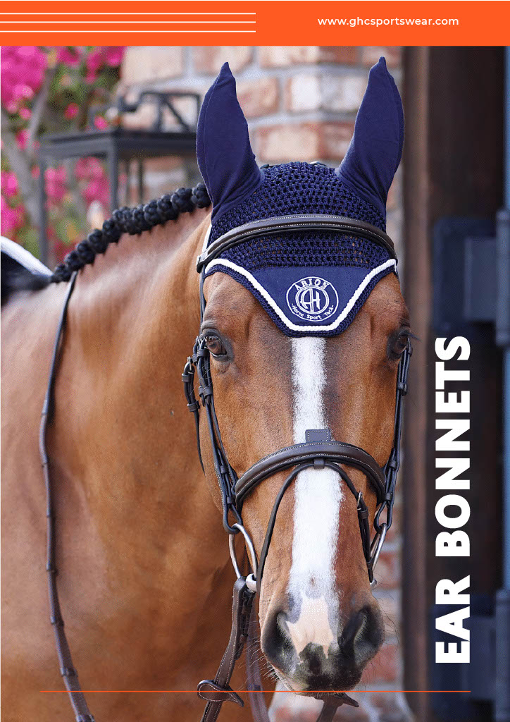 A close-up view of a horse wearing a custom navy blue crochet ear bonnet by GHC Sportswear®, paired with a bridle for professional equestrian use. The bonnet features breathable mesh fabric, a reinforced trim, and embroidered branding. Text on the image reads “EAR BONNETS” and “GHC Sportswear.” This visual highlights OEM and private-label manufacturing for wholesale equestrian gear suppliers, importers, and tack retailers.