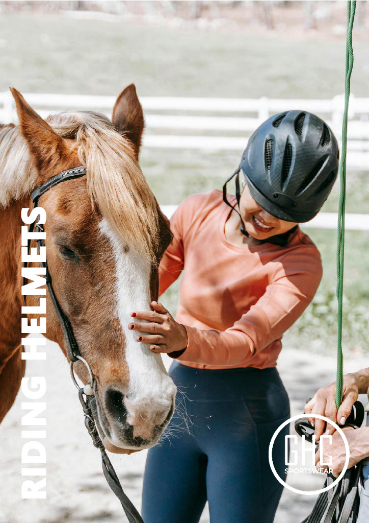 A rider wearing a black GHC Sportswear® riding helmet, gently interacting with a horse — representing comfort, safety, and OEM customization in equestrian helmet production.