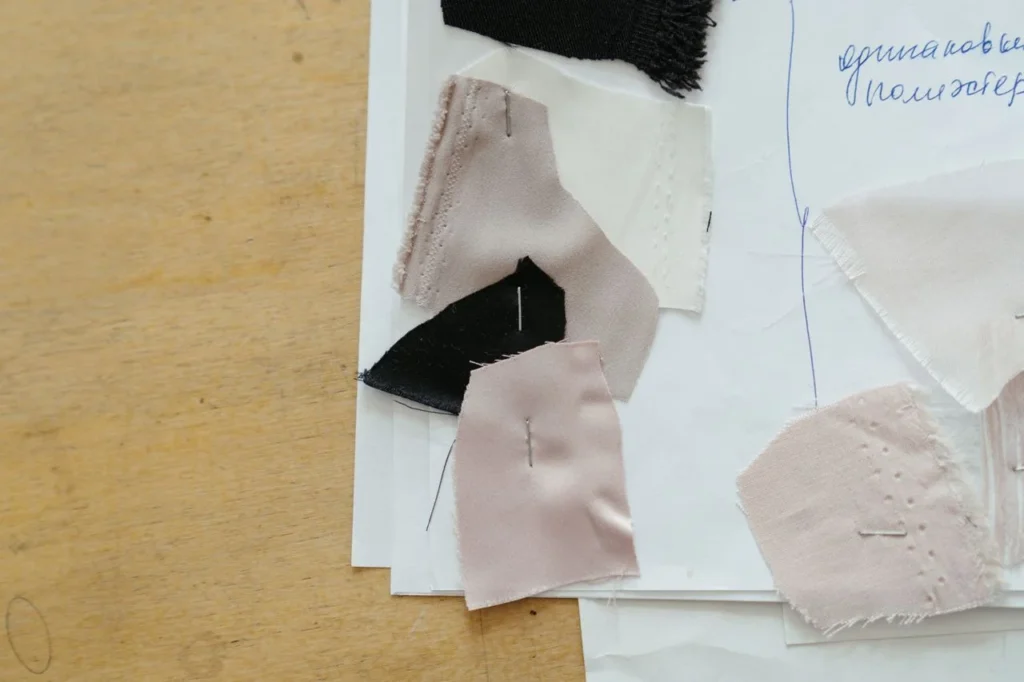 Apparel sampling process with proto samples, fit samples, size set samples, pre-production sample, fabric swatches, tech pack, QC checklist, and bulk production planning.