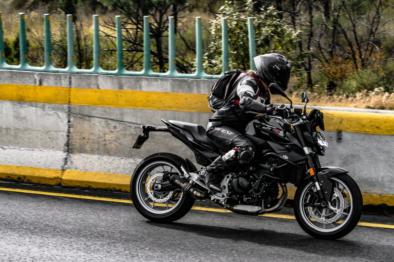 motorcyclist wearing protective gear for custom motorcycle gear manufacturing